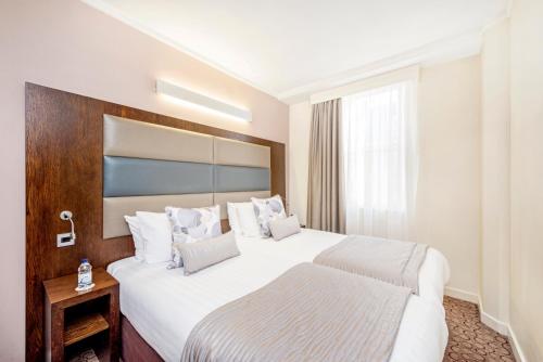Habitación Twin Estándar del hotel Mercure London Paddington. Foto 14