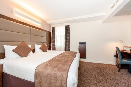 Habitación Twin Estándar del hotel Mercure London Paddington. Foto 16