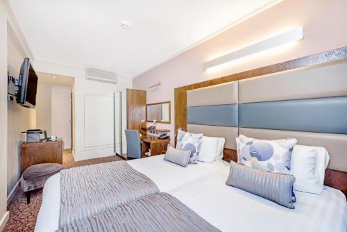 Habitación Executive Twin del hotel Mercure London Paddington. Foto 10