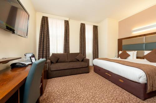 Habitación Executive King con sofá cama del hotel Mercure London Paddington. Foto 13