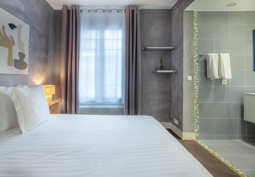 Habitación Doble Estándar del hotel Makom Pereire. Foto 4