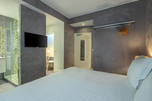 Habitación Doble Estándar del hotel Makom Pereire. Foto 6