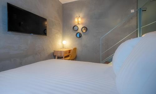 Habitación Doble Pequeña del hotel Makom Pereire. Foto 1