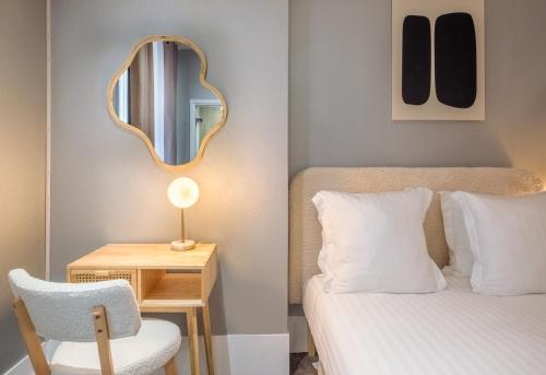 Habitación Cuádruple Clásica del hotel Makom Pereire. Foto 1