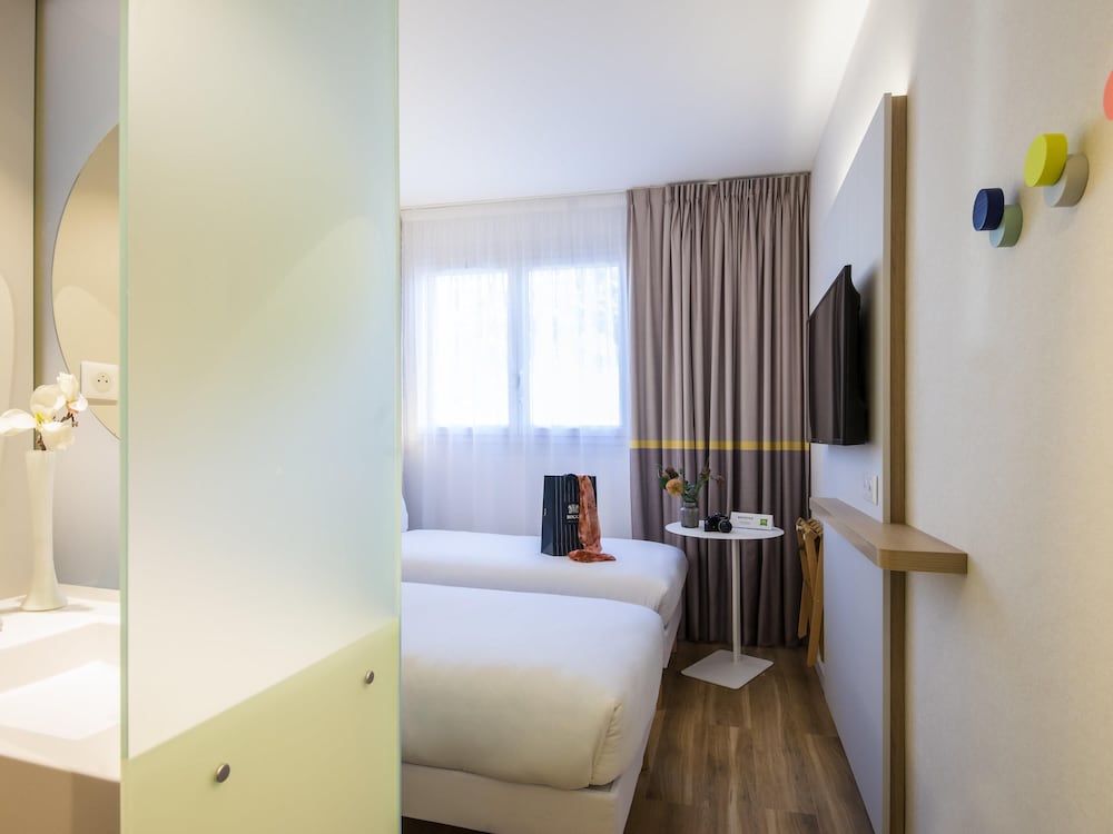Habitación estándar con 2 camas individuales (1 pers. cada una) del hotel Ibis Styles Nice Cap 3000 Aeroport. Foto 2