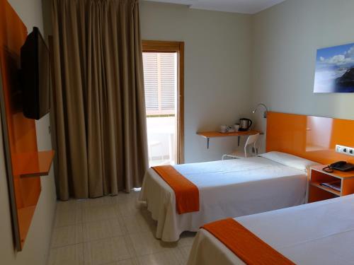 Twin Room with Balcony del hotel Andrea's. Foto 8