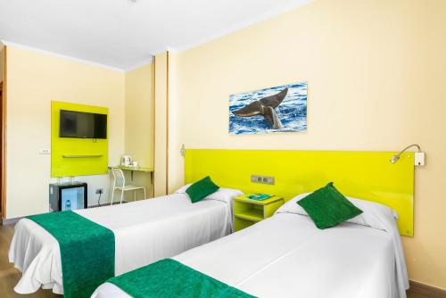 Twin Room with Balcony del hotel Andrea's. Foto 13