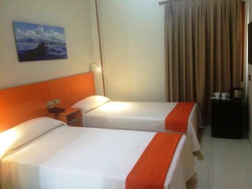 Habitación Doble interior - 1 o 2 camas del hotel Andrea's. Foto 1