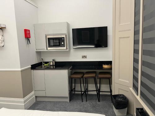 Estudio Executive triple The Whiteley del hotel WHITELEAF. Foto 1