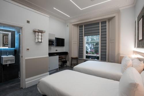 Estudio Executive triple The Whiteley del hotel WHITELEAF. Foto 2