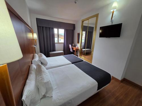 Habitación Doble con cama supletoria - 2 camas del hotel Saylu. Foto 1