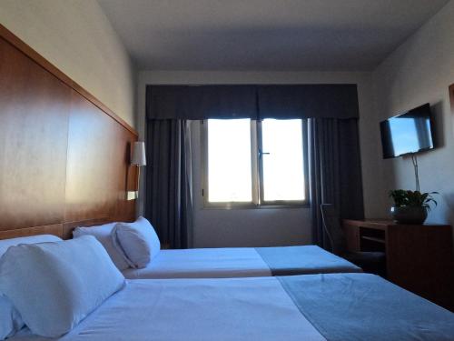 Habitación Doble Económica del hotel Saylu. Foto 2