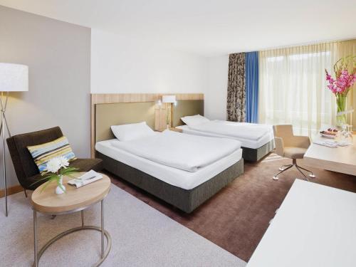 Habitación Doble Superior con 2 camas grandes del hotel Mövenpick Zürich Regensdorf