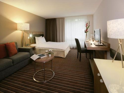 Habitación Superior - 1 cama grande del hotel Mövenpick Zürich Regensdorf. Foto 1