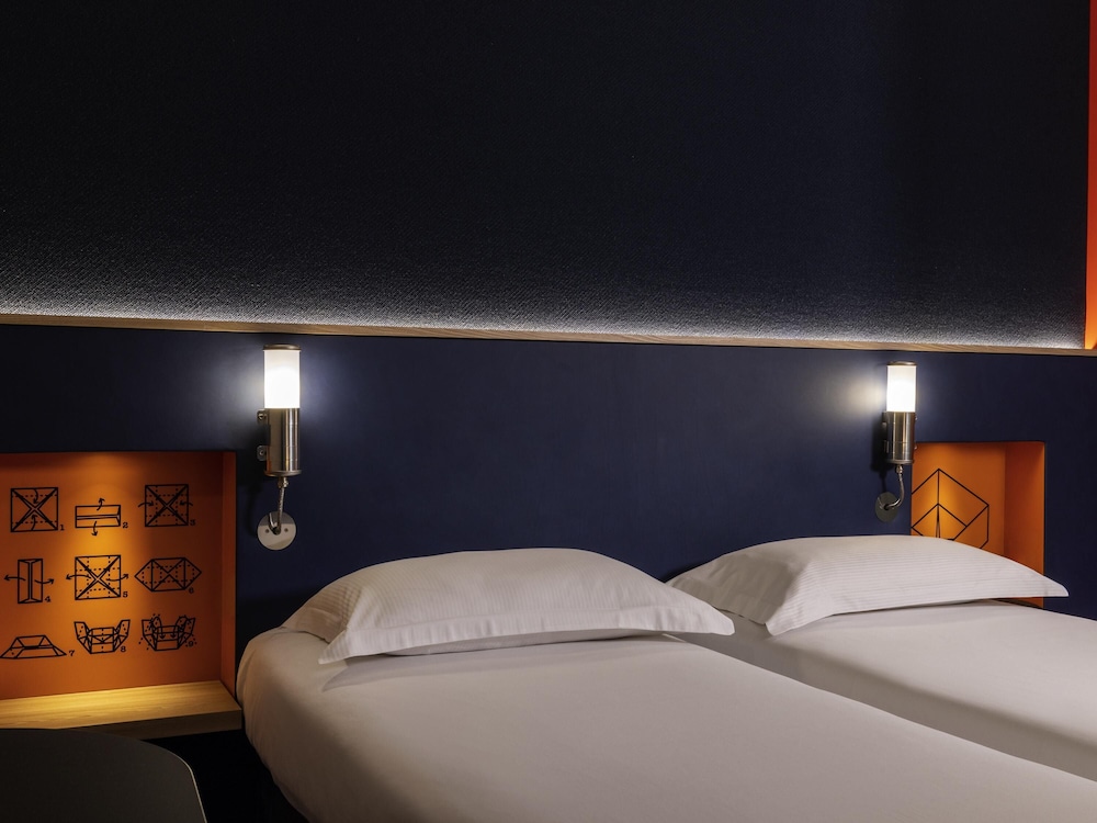 Habitación estándar con 2 camas individuales del hotel Ibis Styles Bourg La Reine. Foto 1