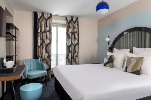 Habitación Doble Clásica del hotel Régina Opéra Grands Boulevards. Foto 10