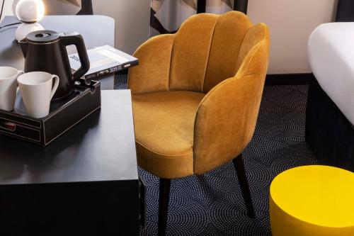 Habitación Triple Superior (1 cama doble + 1 cama individual) del hotel Régina Opéra Grands Boulevards. Foto 3