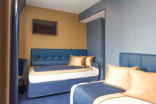 Habitación Triple Superior del hotel Trianon Gare de Lyon. Foto 1