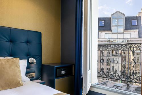 Habitación Triple Superior del hotel Trianon Gare de Lyon. Foto 6