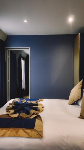 Habitación Cuádruple Deluxe del hotel Trianon Gare de Lyon. Foto 1