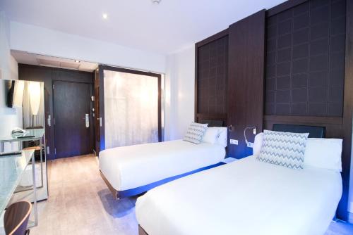 Habitación Doble del hotel Petit Palace President Castellana. Foto 4