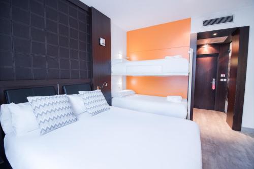 Habitación Cuádruple del hotel Petit Palace President Castellana