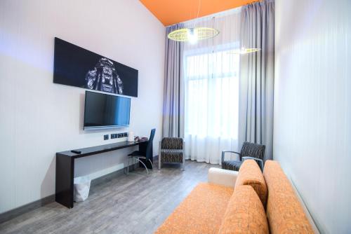 Habitación Cuádruple Dúplex del hotel Petit Palace President Castellana. Foto 3