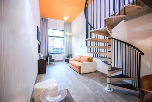 Habitación Cuádruple Dúplex del hotel Petit Palace President Castellana. Foto 4