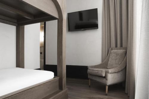 Habitación Cuádruple del hotel Icon Wipton. Foto 1