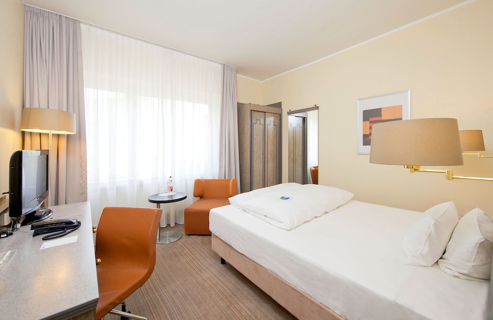Habitación Estándar con cama individual del hotel Mercure Dortmund Centrum. Foto 1