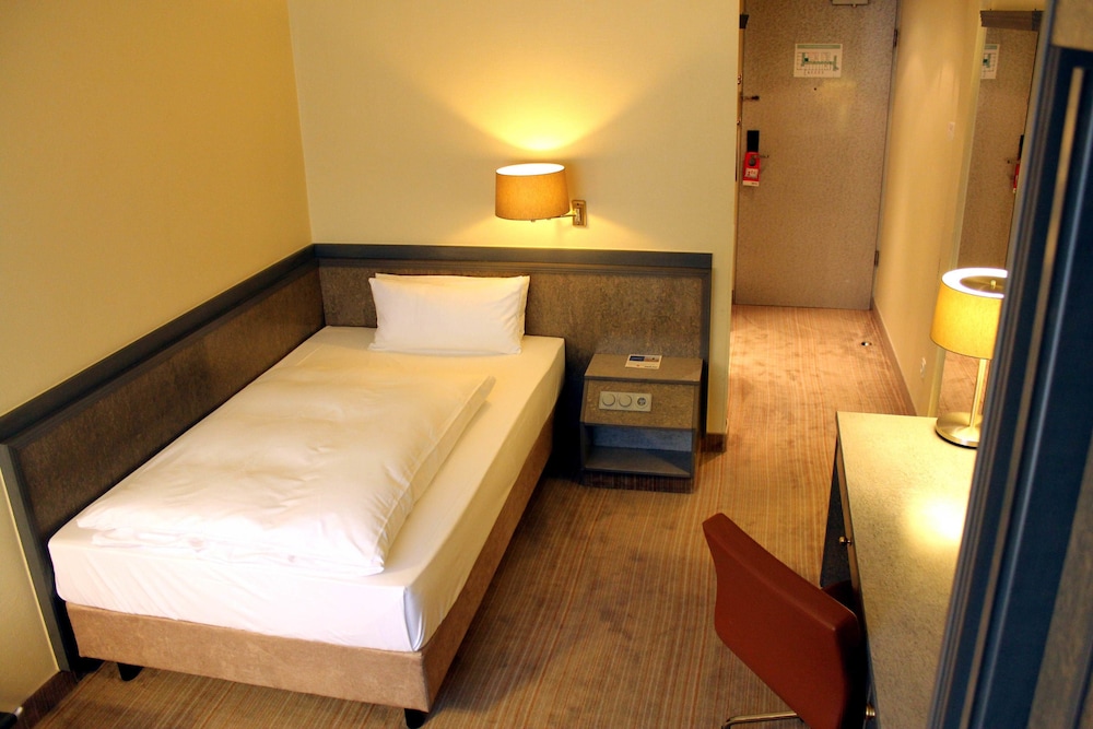 Habitación Estándar con cama individual del hotel Mercure Dortmund Centrum. Foto 2