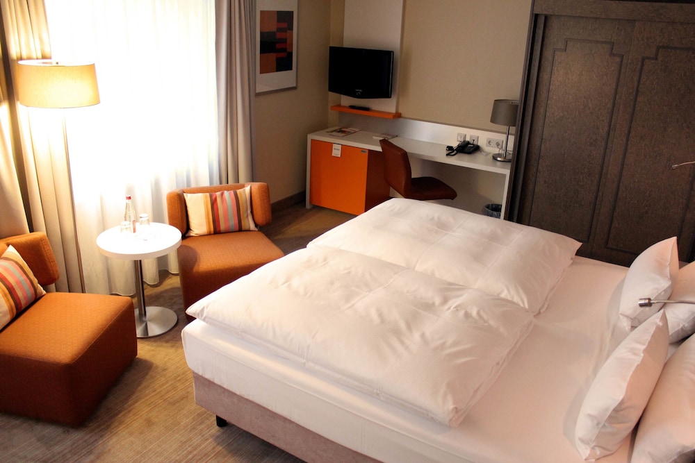 Habitación estándar con cama king o dos camas individuales del hotel Mercure Dortmund Centrum. Foto 2