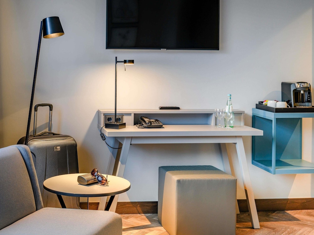 Habitación estándar con cama king o dos camas individuales del hotel Mercure Dortmund Centrum. Foto 6