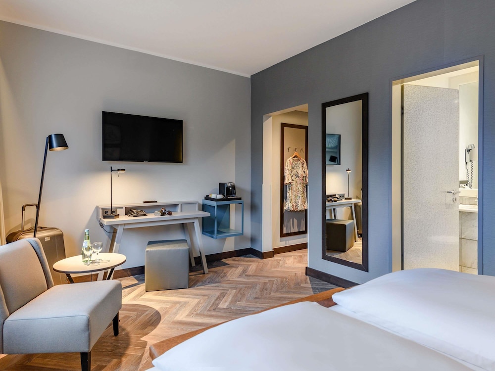 Habitación estándar con cama king o dos camas individuales del hotel Mercure Dortmund Centrum. Foto 7
