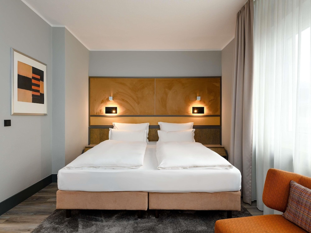 Habitación estándar con cama king o dos camas individuales del hotel Mercure Dortmund Centrum. Foto 10