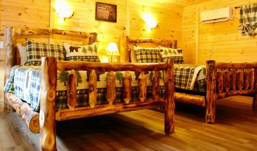 Suite Familiar Deluxe del hotel Sundowner On Lake George. Foto 13