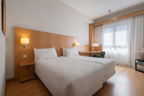 Habitación Doble Estándar - 2 camas del hotel Crisol Leganés. Foto 13