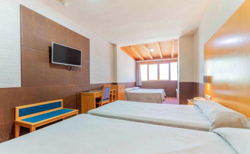 Habitación Cuádruple del hotel Checkin Camino de Granada. Foto 3