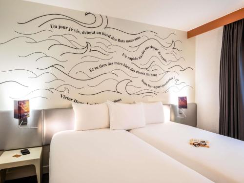 Habitación Doble Estándar - 2 camas del hotel Ibis Styles Paris Tolbiac Biblioteque. Foto 11