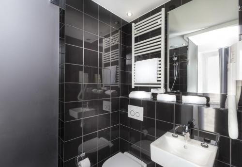 Habitación Confort del hotel Libertel Montmartre Opéra