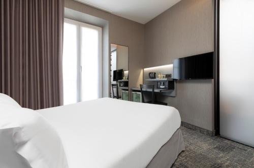 Habitación Confort del hotel Libertel Montmartre Opéra. Foto 3