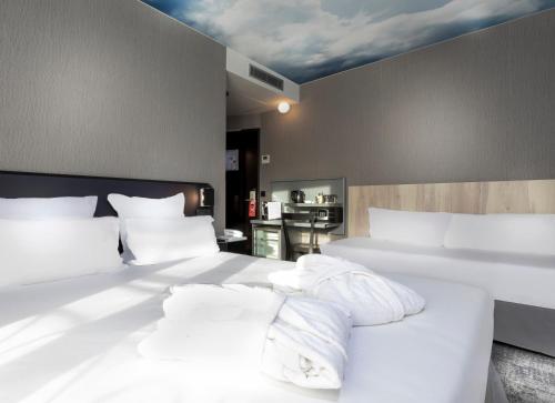 Habitación Familiar del hotel Libertel Montmartre Opéra. Foto 4
