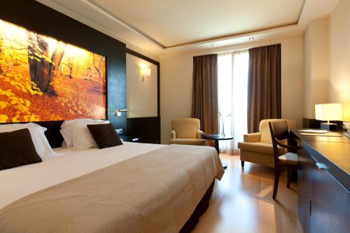 Habitación superior con balcón del hotel Nelva. Foto 1