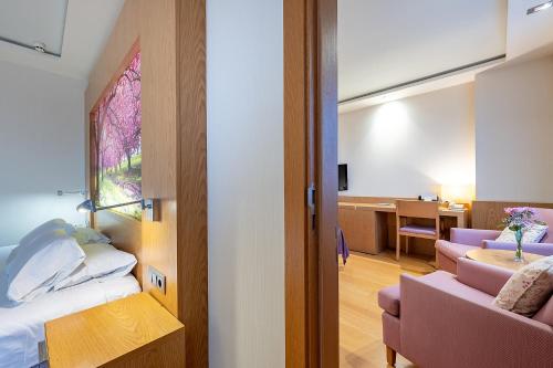 Habitación cuádruple del hotel Nelva. Foto 8