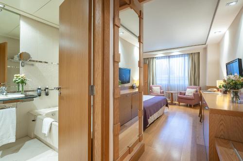Habitación cuádruple del hotel Nelva. Foto 10