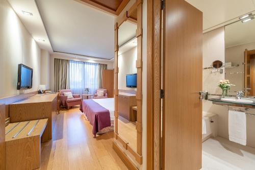 Habitación cuádruple del hotel Nelva. Foto 11