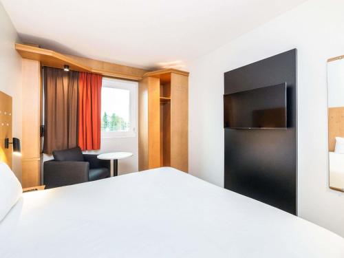 Habitación Doble Estándar del hotel Ibis Alcalá De Henares La Garena. Foto 11