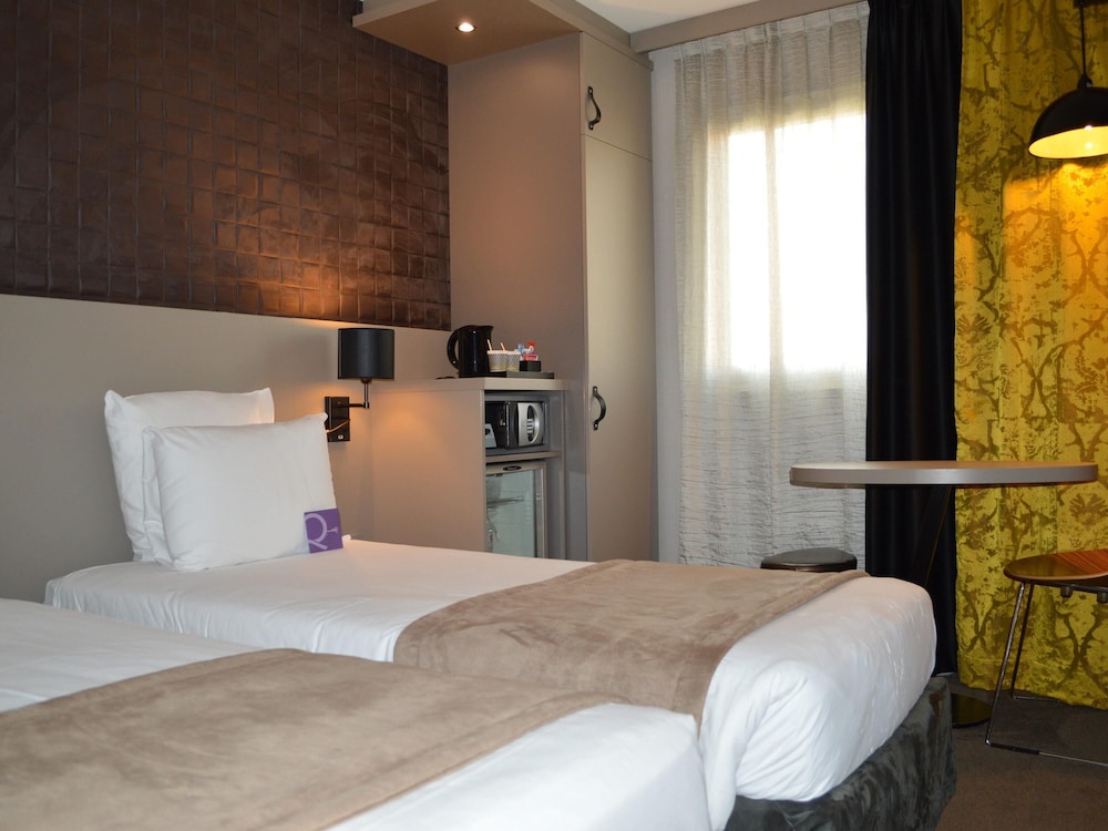 Habitación Privilege con camas individuales del hotel Mercure Paris Porte De Pantin