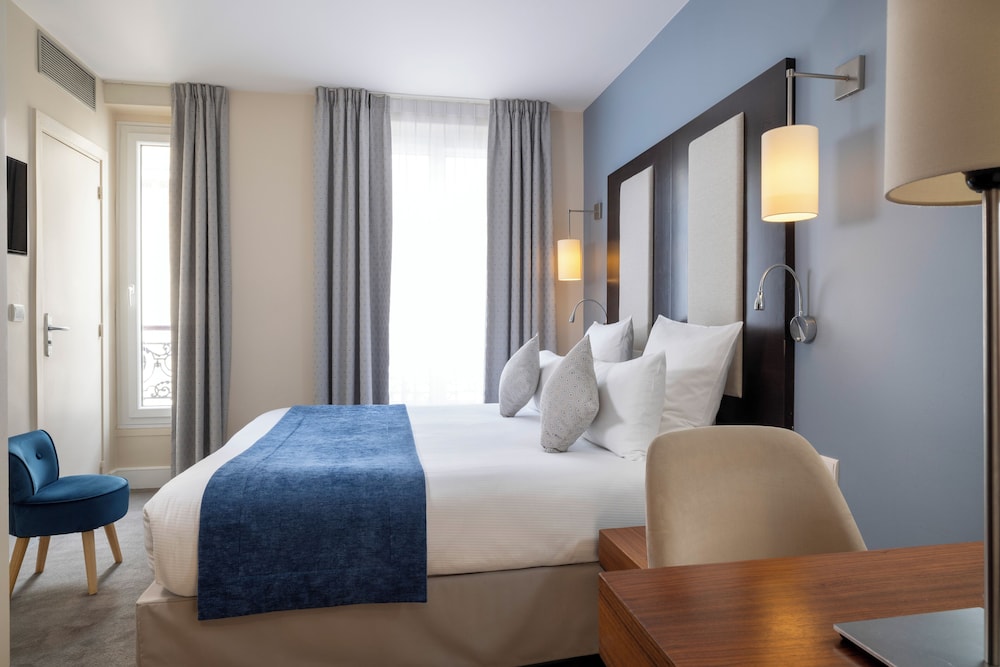 Habitación clásica doble del hotel Elysées Bassano