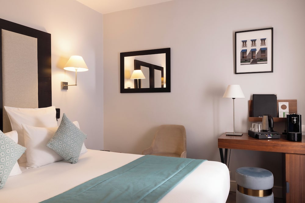 Habitación clásica doble del hotel Elysées Bassano. Foto 3
